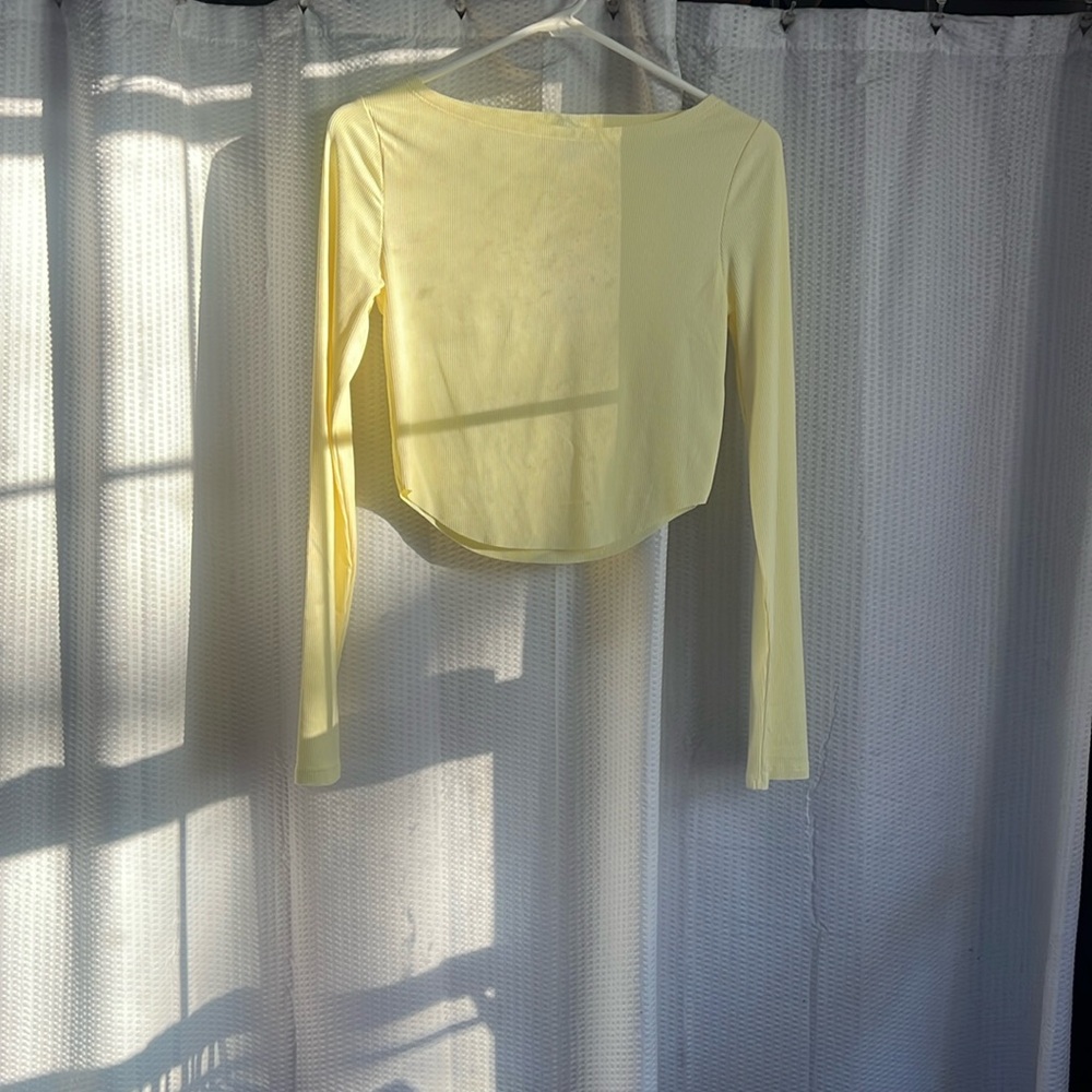 Small yellow long sleeve top